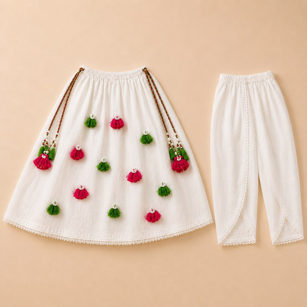 Ivory Garden Tassel Frock For Baby Girl For 14th August .