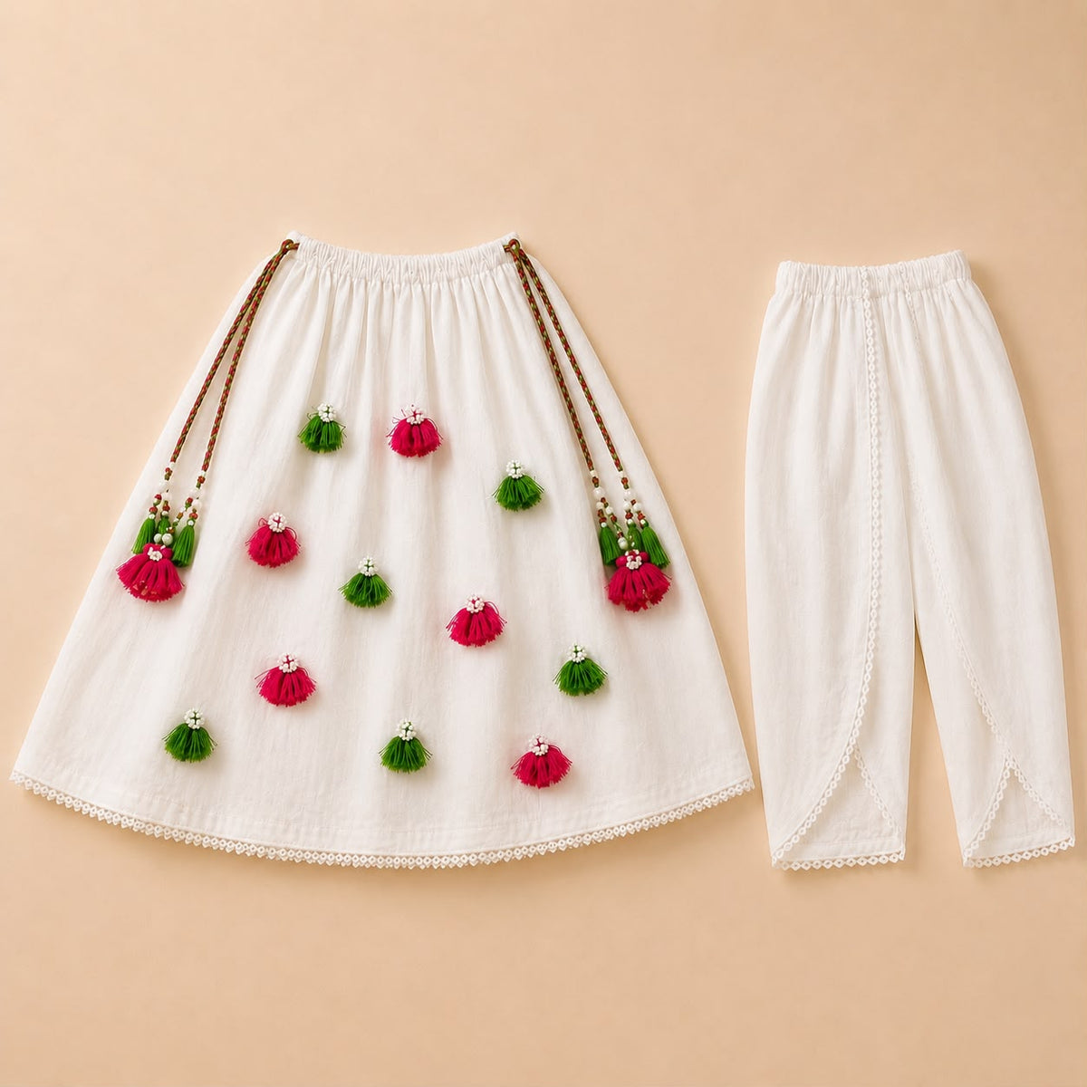 Ivory Garden Tassel Frock For Baby Girl For 14th August .